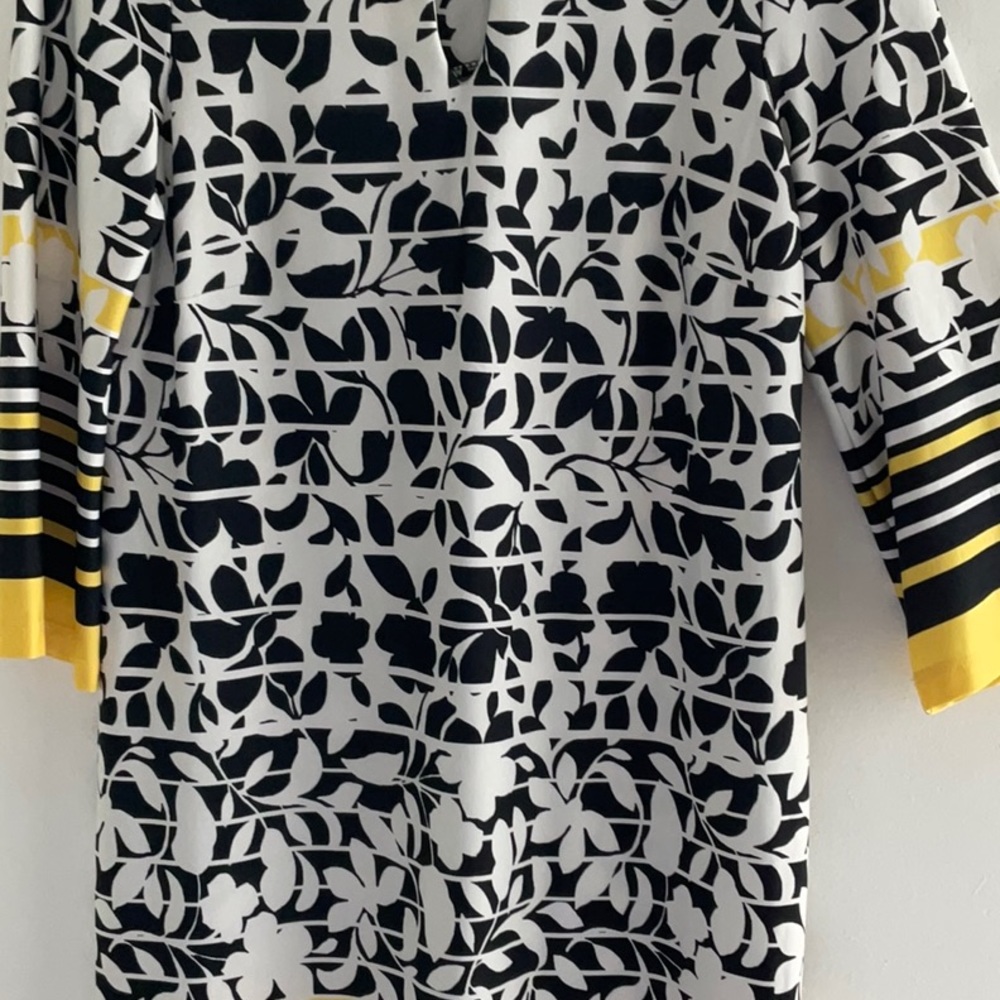 Dress by Emma & Micheal Large in size white black and yellow in color